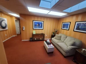 waiting room with couch and tables